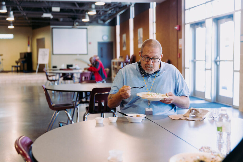 guest eating a meal at the mission