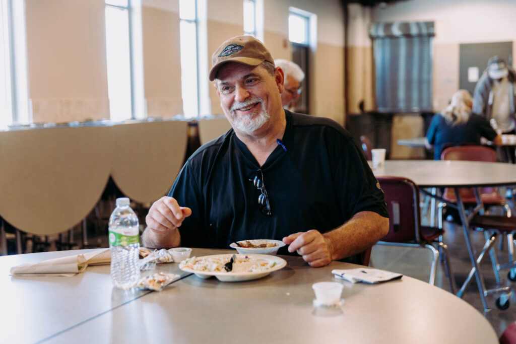 guest eating a meal at the mission