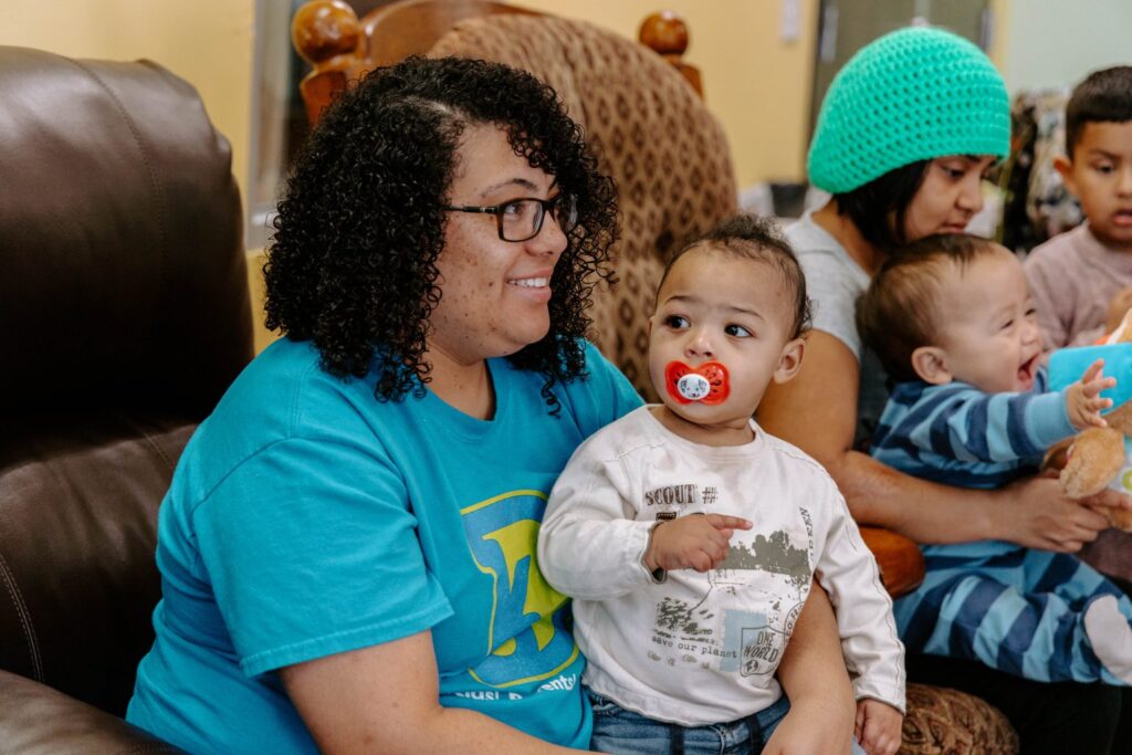 Mom and baby during diaper drive.