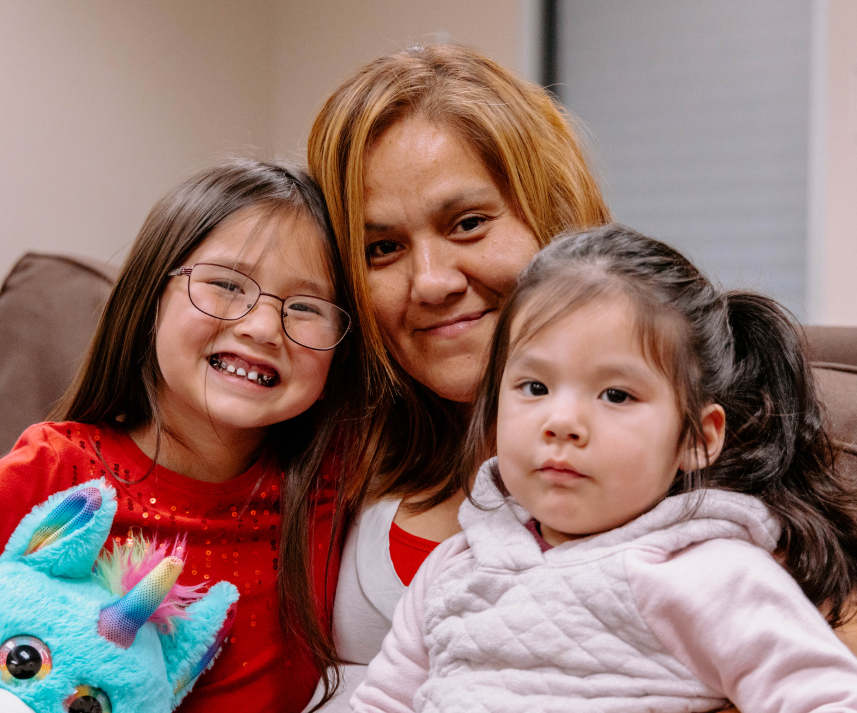 A woman with two young girls seeks immediate assistance at Open Door Mission. 